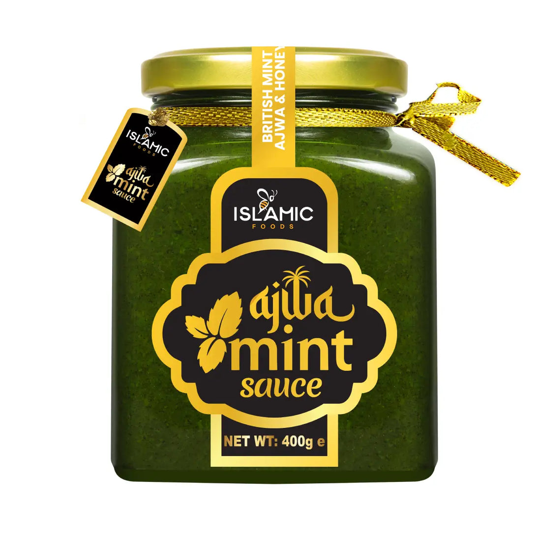Green jar of ajila mint sauce with gold label on a white background