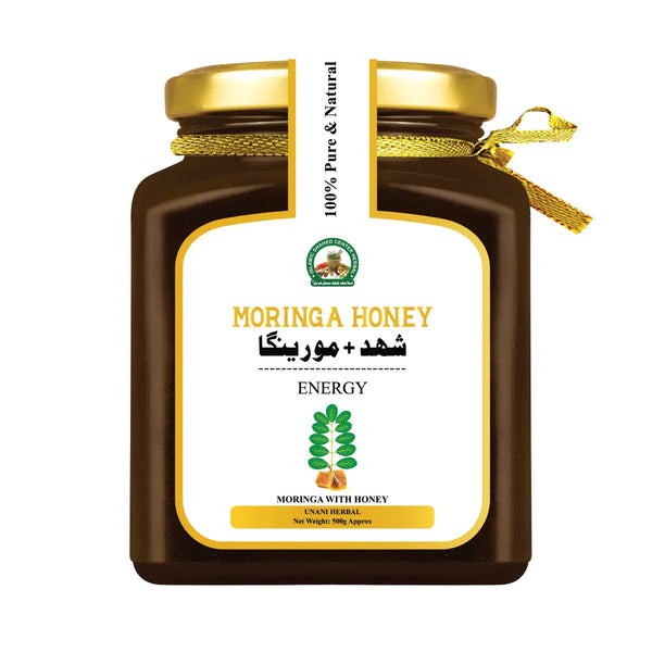 Jar of moringa honey with a gold lid on a white background